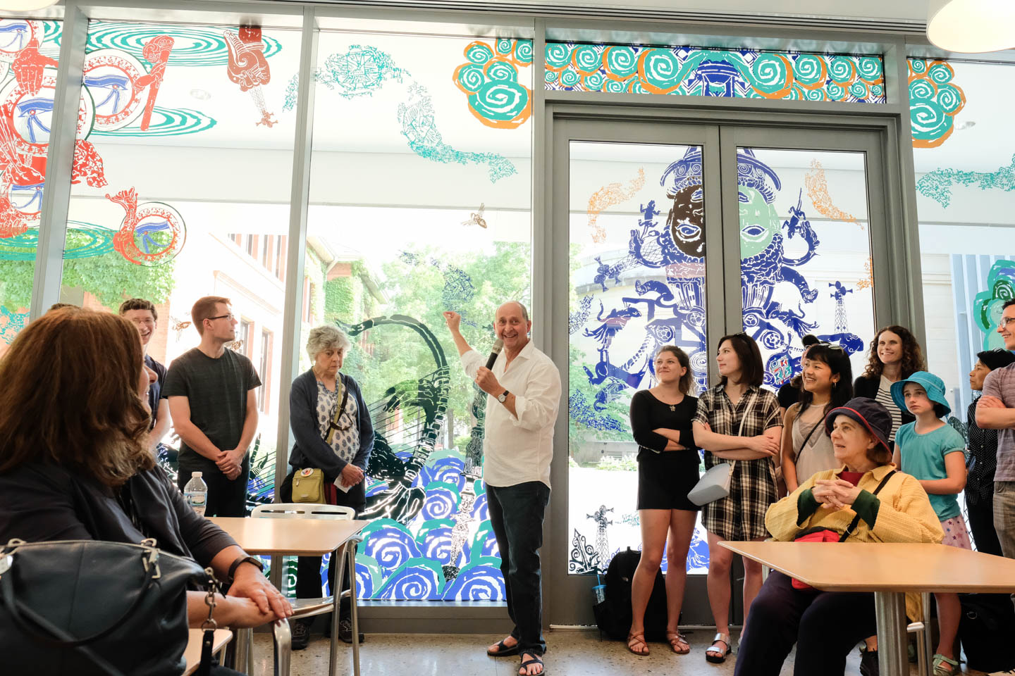 Jim Cogswell giving a tour of 'Cosmogonic Tattoos,' (Photo by Mark Gjukich)