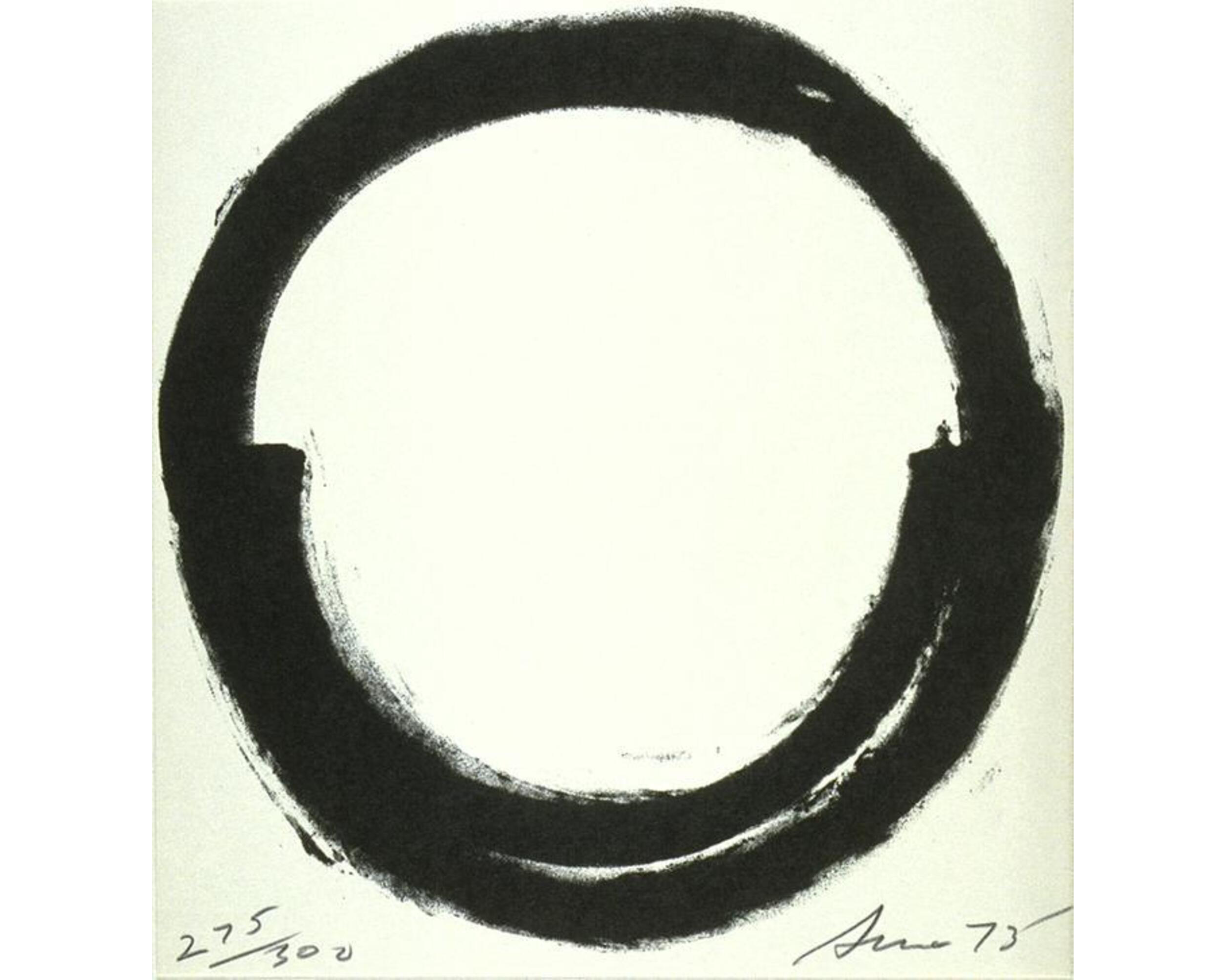 A print of the thick black outline of a circle. Within the circle is a semicircle. 