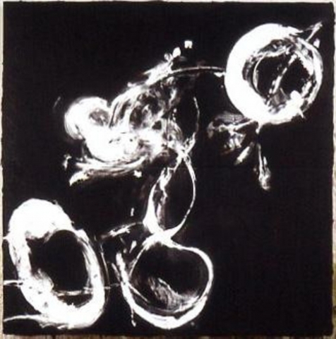 White smoke rings on a black background