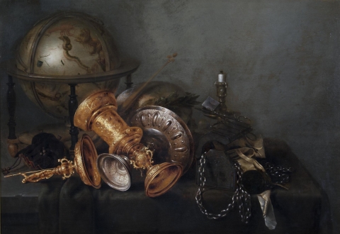 This remarkable still life depicts a table crowded with, among other things, a gilded covered goblet, a wide saucer-shaped silver tazza, a celestial globe painted with images of the constellations, a skull wearing a laurel wreath, and an extinguished candle, all rendered in exquisite detail with careful attention paid to the effects of light and texture. While the arrangement of objects may appear casual, the composition is artfully balanced along two diagonal axes centered on the two cups that lie crossed 