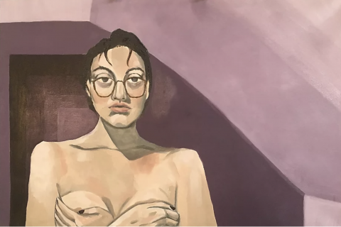 A painting of a topless woman with short brown hair and glasses. She stands against a purple wall and her hands are covering her breasts